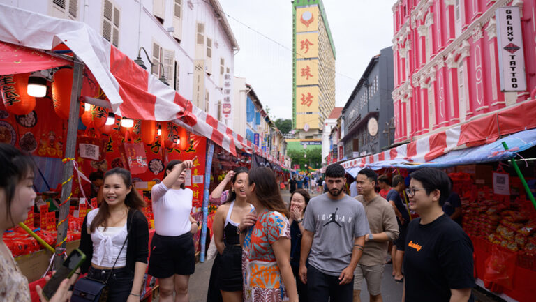 Tourists on an interactive tour to Singapore's local wet market