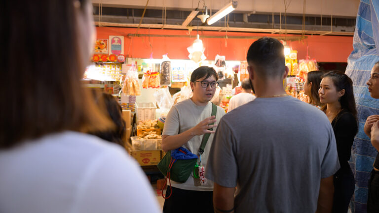 Tourists on an interactive tour to Singapore's local wet market
