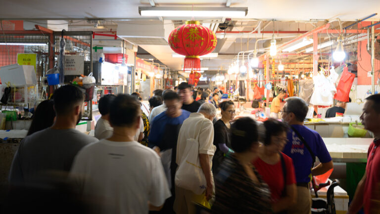 Tourists on an interactive tour to Singapore's local wet market