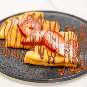 strawberry crepes with chocolate sauce children kids baking class